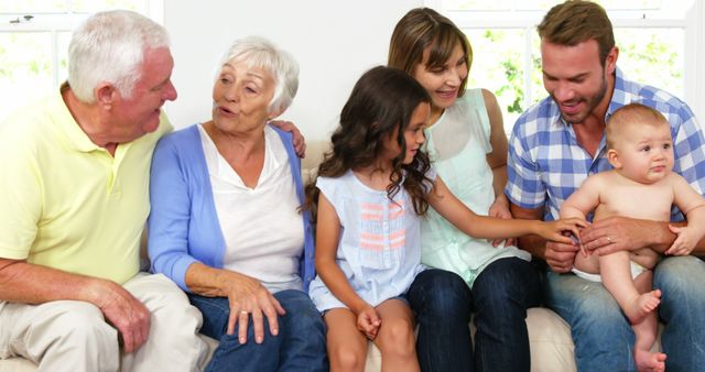 Multigenerational Family Enjoying Quality Time in Living Room - Download Free Stock Images Pikwizard.com