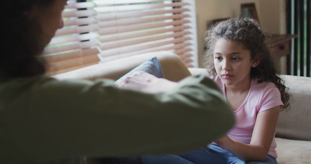 Mother Comforting Worried Daughter Sitting on Sofa - Download Free Stock Images Pikwizard.com