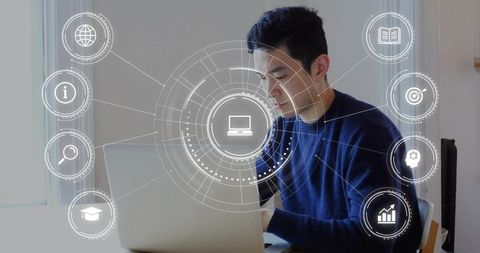 Asian Man Working from Home on Laptop with Digital HUD Overlays for Remote Productivity