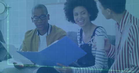 Diverse team collaborating in modern lounge with digital interface