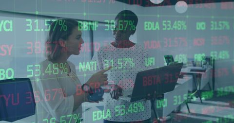 businesswomen analyzing stock market data with technology focus - Download Free Stock Images Pikwizard.com