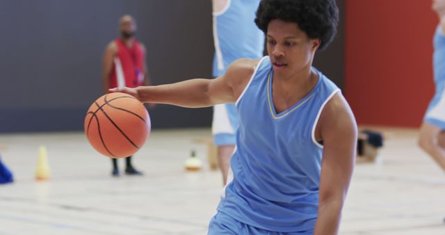 Basketball Player Dribbling Indoors During Game - Download Free Stock Images Pikwizard.com