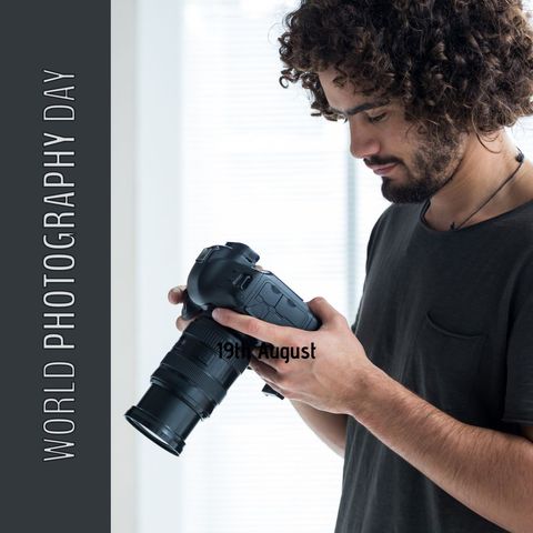 young man examines dslr camera for world photography day - Download Free Stock Templates Pikwizard.com