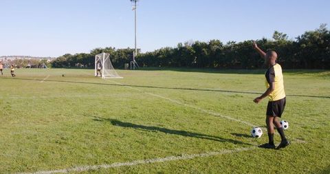 Soccer Player Signaling Strategy on Sunny Field