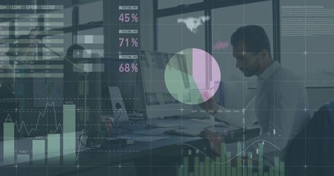 Business analyst reviewing financial data at modern office workspace