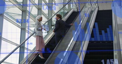 Business Professionals Analysing Digital Data on Office Escalator - Download Free Stock Images Pikwizard.com