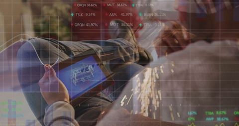 Modern Makers Using Tablets and Tools in Workshop