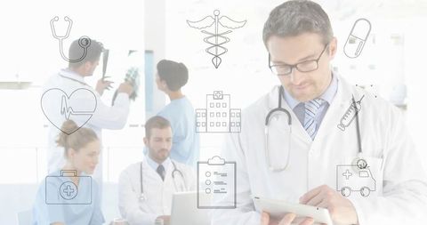 Doctor tapping tablet with medical team and icons overlay for healthcare collaboration