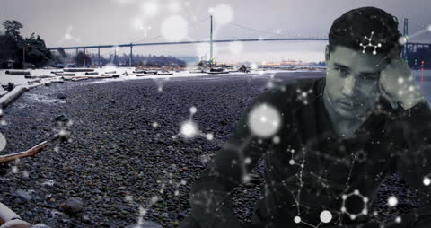 Man with Overlapping Digital Network Graphics in Urban Landscape