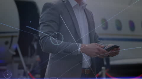 Businessman by Private Jet Using Smartphone with Digital Connections