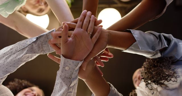 Diverse Team Stacking Hands for Unity and Teamwork - Download Free Stock Images Pikwizard.com