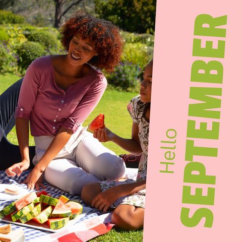 African American Mother and Daughter Enjoying September Picnic Outdoors