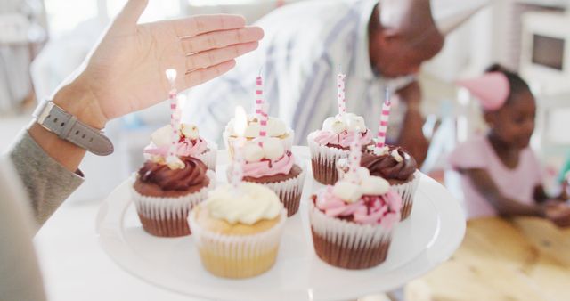 Birthday Cupcakes with Candles at Family Party - Download Free Stock Images Pikwizard.com