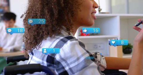 Smiling Businesswoman in Wheelchair Engaged in Corporate Training