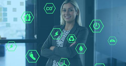 Ecology Symbols Overlay Businesswoman in Modern Office
