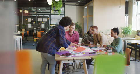 Diverse Team Collaborating in Modern Office Workshop