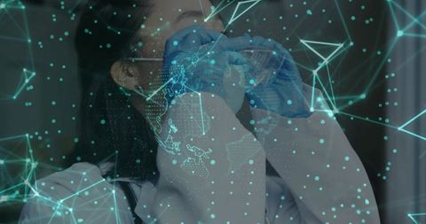 Scientist analyzing test tube with digital network overlay