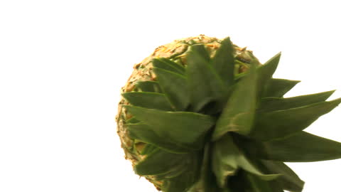 Rotating Pineapple Against White Background