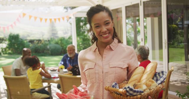 Woman Serving Food During Family Outdoor Picnic - Download Free Stock Images Pikwizard.com