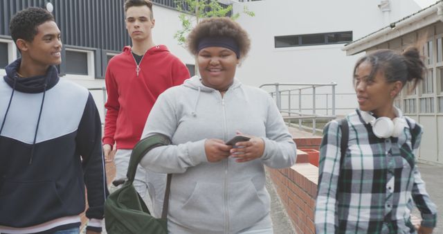 Group of Diverse Teenagers Walking and Smiling Together Outdoors - Download Free Stock Images Pikwizard.com