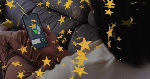 Woman holding phone viewing analytics dashboard on sofa with gold star confetti overlay