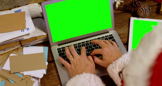 Santa Claus Typing on Laptop with Green Screen - Download Free Stock Images Pikwizard.com