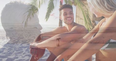 Cheerful Couple Relaxing on Tropical Beach