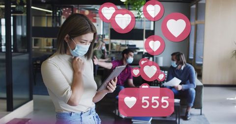 Businesspeople Using Digital Devices with Social Media Icons and Masks