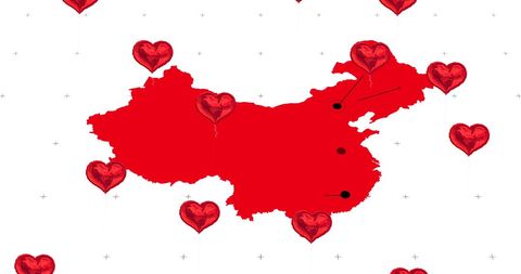 Heart shaped balloons floating over red map