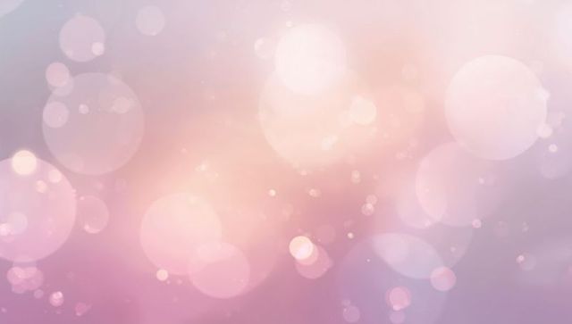 Glowing Pastel Bokeh Background Featuring Soft Lavender Pink Orbs and Light Halos