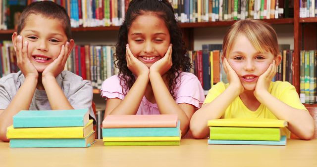 Children Enjoying Reading in Colorful Library Setting - Download Free Stock Images Pikwizard.com