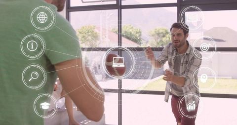 Friends tossing football indoors with augmented reality hud overlay for tech lifestyle