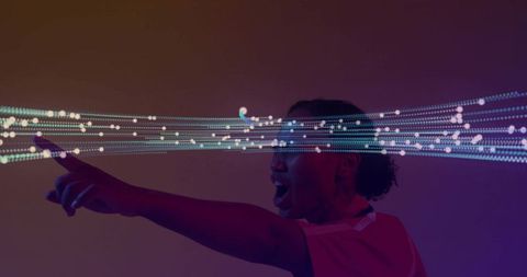 Energetic woman with futuristic digital streams