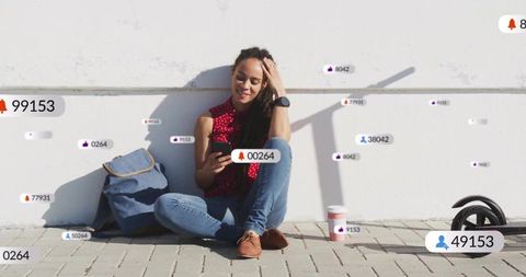 Youthful Woman Checking Smartphone Surrounded by Social Media Icons