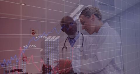 Diverse Doctors Analyzing Patient Data with Digital Graphs - Download Free Stock Images Pikwizard.com