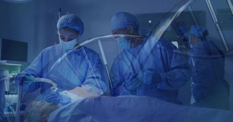 Medical team performing surgery in operating room setting