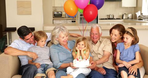 Happy Family Celebrating Birthday at Home