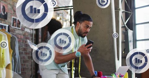 Entrepreneurs Analyzing Data with Digital Interfaces