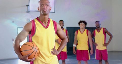 Dedicated Basketball Team Stands Ready on Indoor Court