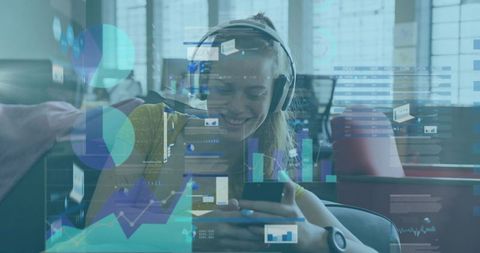 Smiling woman wearing headphones using smartphone with data visualization overlay in modern lounge