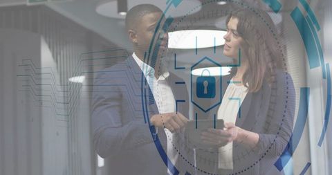 Professionals Discussing Cybersecurity Solutions in Data Center