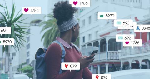 Person Using Smartphone Surrounded by Social Media Engagement Notifications