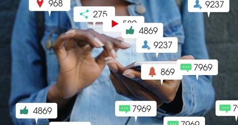 Tapping smartphone while receiving social media notification bubbles, mobile engagement