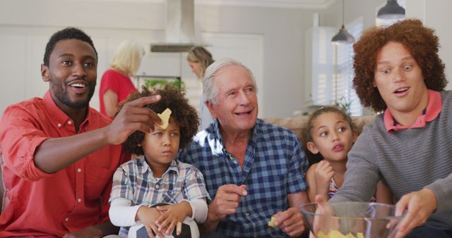 Happy Multigenerational Family Enjoying Snacks Together - Download Free Stock Images Pikwizard.com