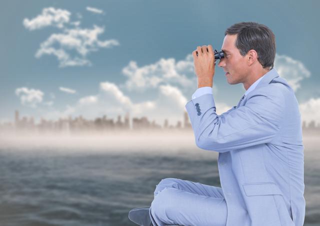 Digital composite of Business man with bionoculars against water and blurry skyline