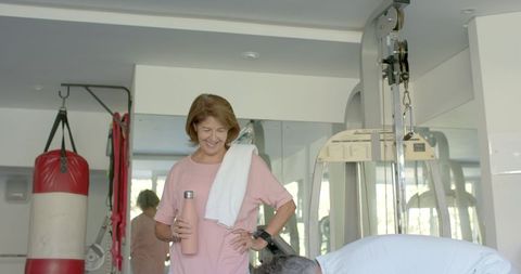 Senior Couple Enjoying Fitness Workout at Home Gym