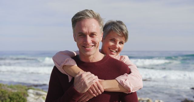 Smiling Happy Senior Couple Embracing at Beach - Download Free Stock Images Pikwizard.com