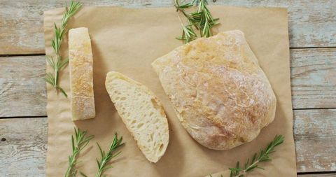 Rustic Bread with Rosemary on Baking Paper, Culinary Delight