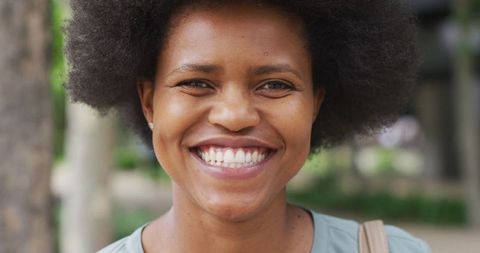 Smiling African American Woman in Outdoor Urban Scene