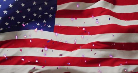 Celebratory Confetti Over Waving USA Flag